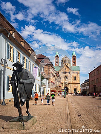 Pilgrim statue and western facade of Speyer Cathedral, Germany Editorial Stock Photo